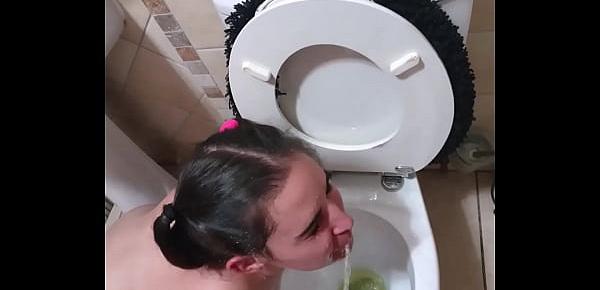  Pigtailed teen sucks dick after being pissed on and licking the toilet clean | face spitting and slapping